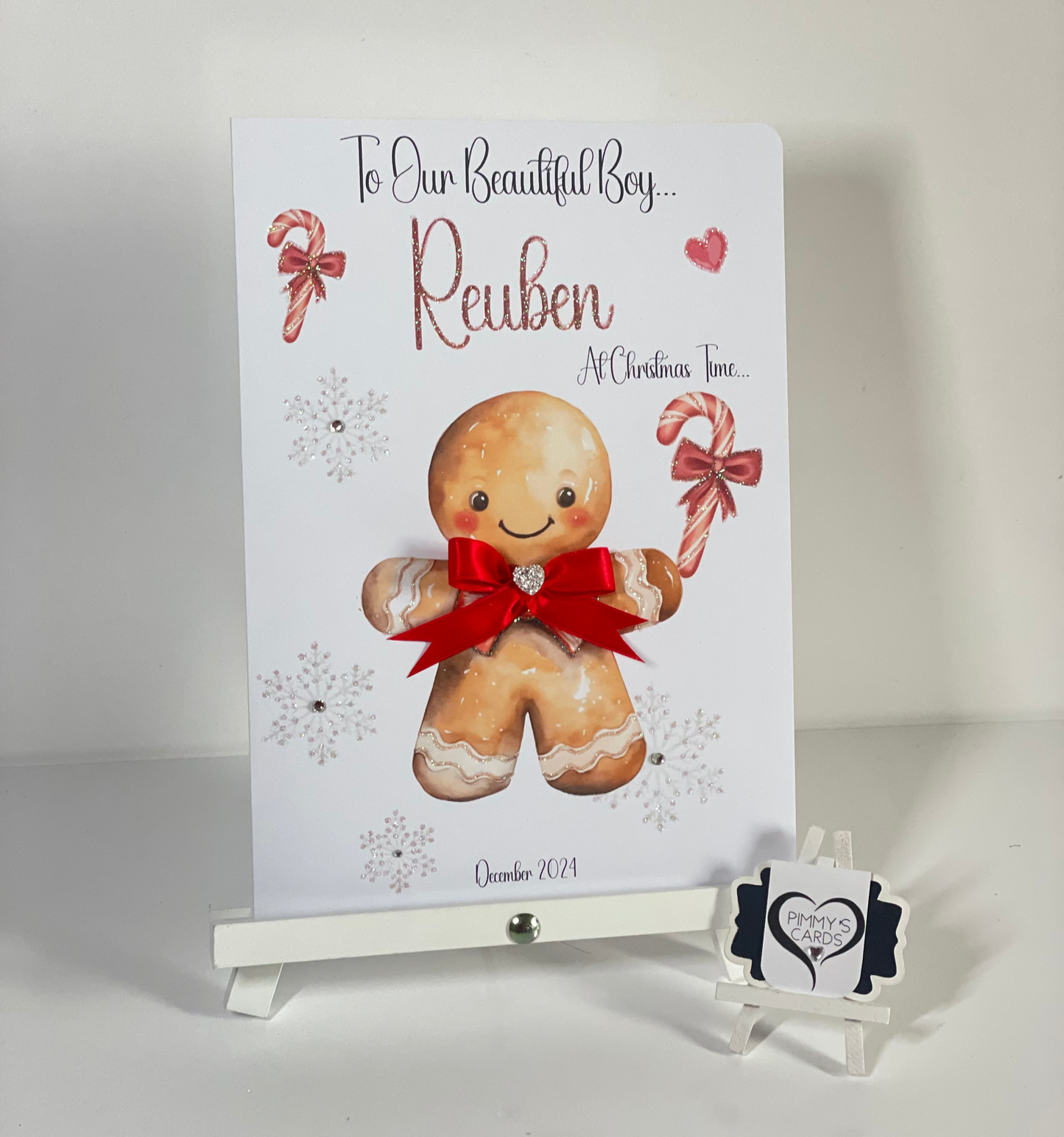 Personalised Christmas card with red gingerbread man and candy cane