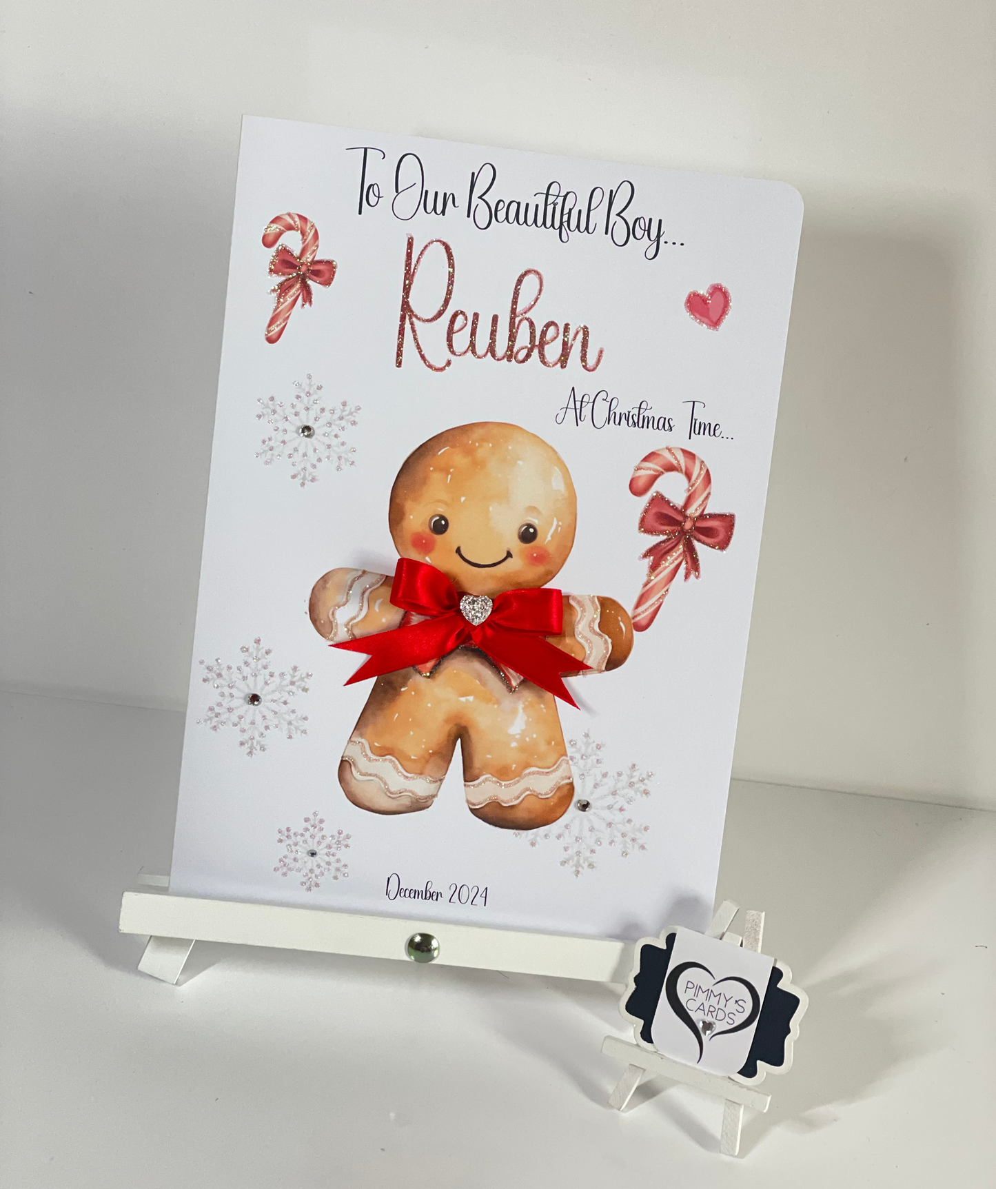 Personalised Christmas card with red gingerbread man and candy cane