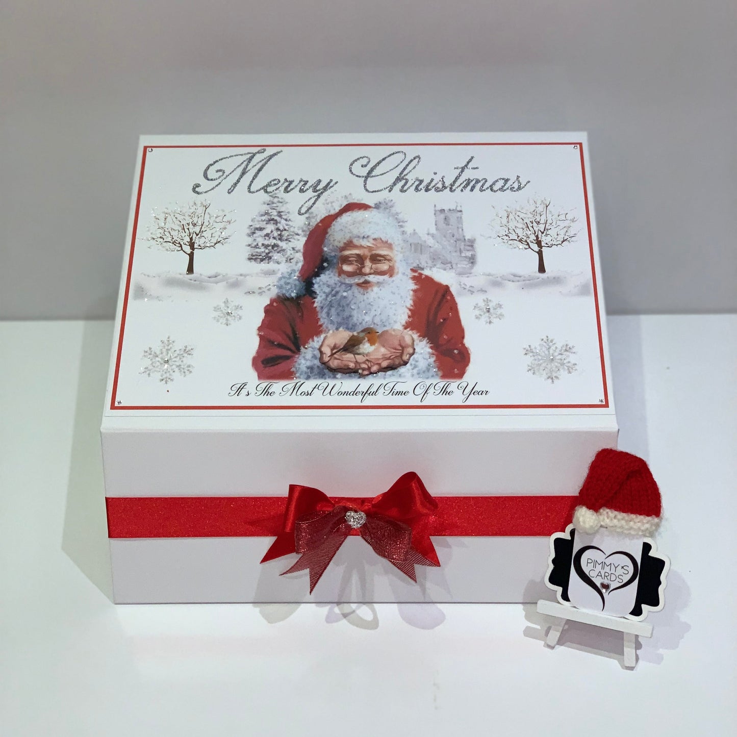 Personalised Christmas Box and Christmas Eve box with father Christmas holding robin.