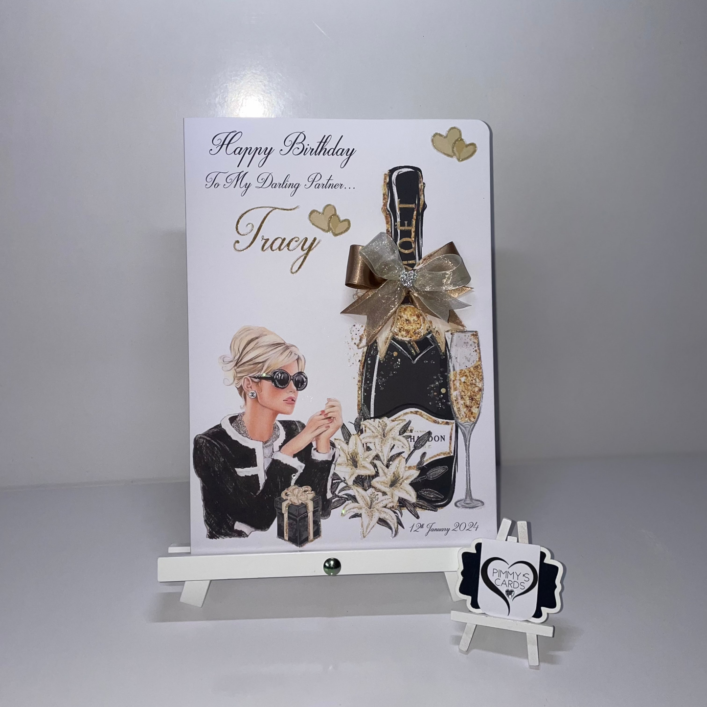 Glamours lady black & gold Moet champagne flowers