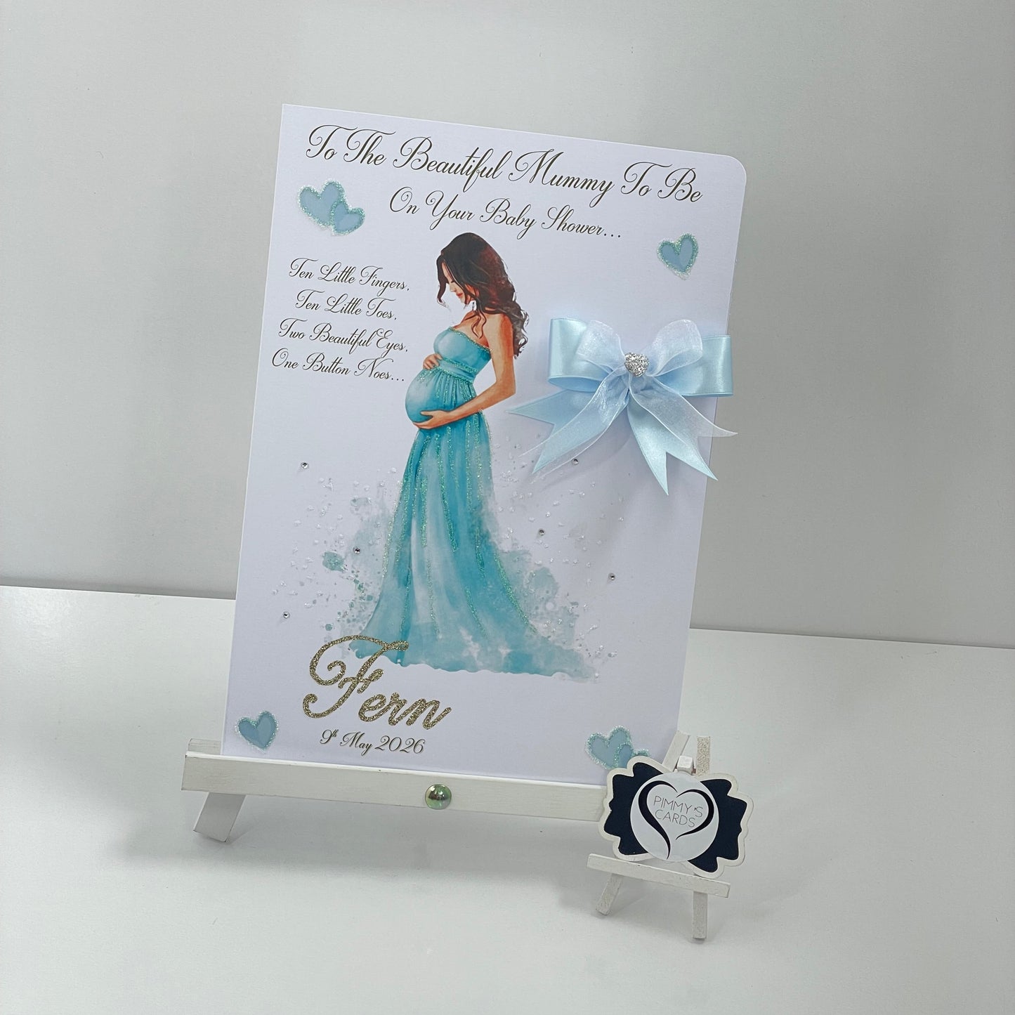 Lady Holding Her Baby Bump Blue Dress