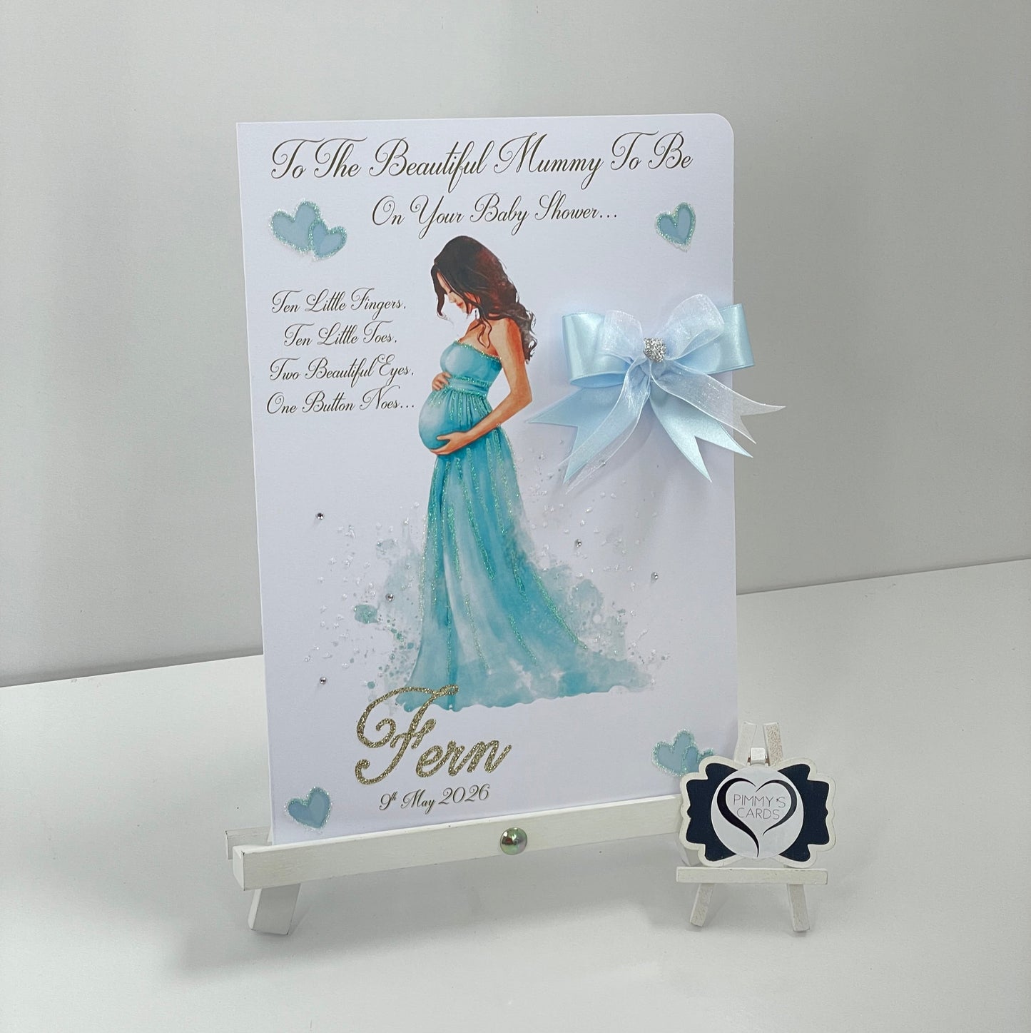 Lady Holding Her Baby Bump Blue Dress