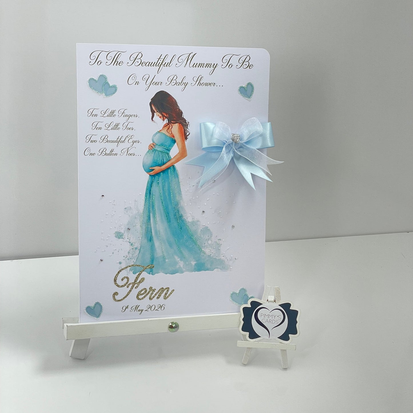 Lady Holding Her Baby Bump Blue Dress
