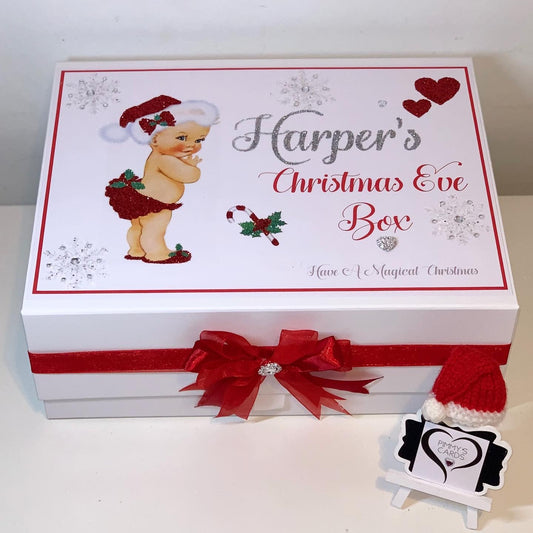 Personalised Christmas Eve box with a baby design and red ribbon, featuring 'Harper's Christmas Eve Box' text.