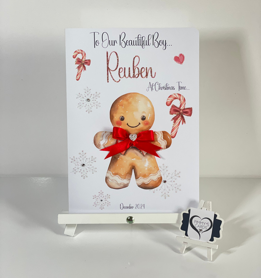 Personalised Christmas card with red gingerbread man and candy cane 