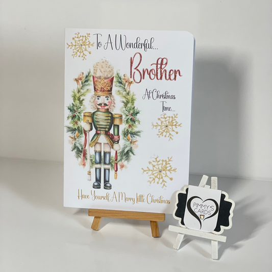 Christmas card with nutcracker design on a white background