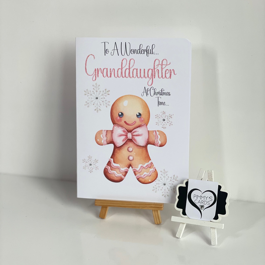 Pink Gingerbread man theme Christmas cards snowflakes.