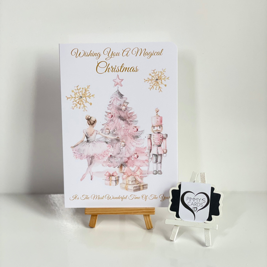 Pink Christmas card nutcracker theme 