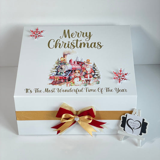Decorative Christmas gift box with festive design and ribbon. Christmas Eve Boxes or Christmas Boxes for presents.
