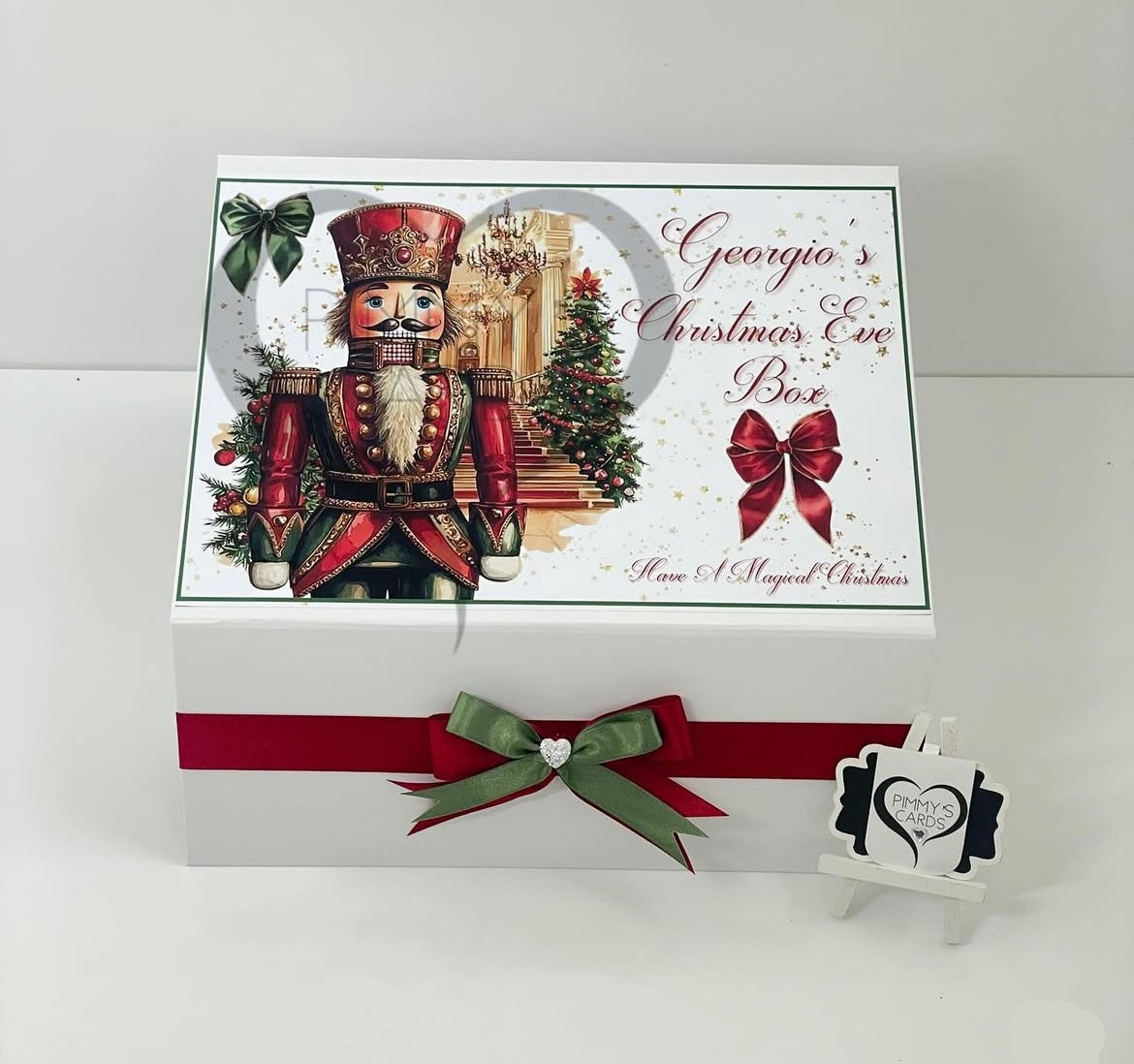 Personalised Christmas eve boxes Christmas themed gift box with Nutcracker design and decorative ribbon.