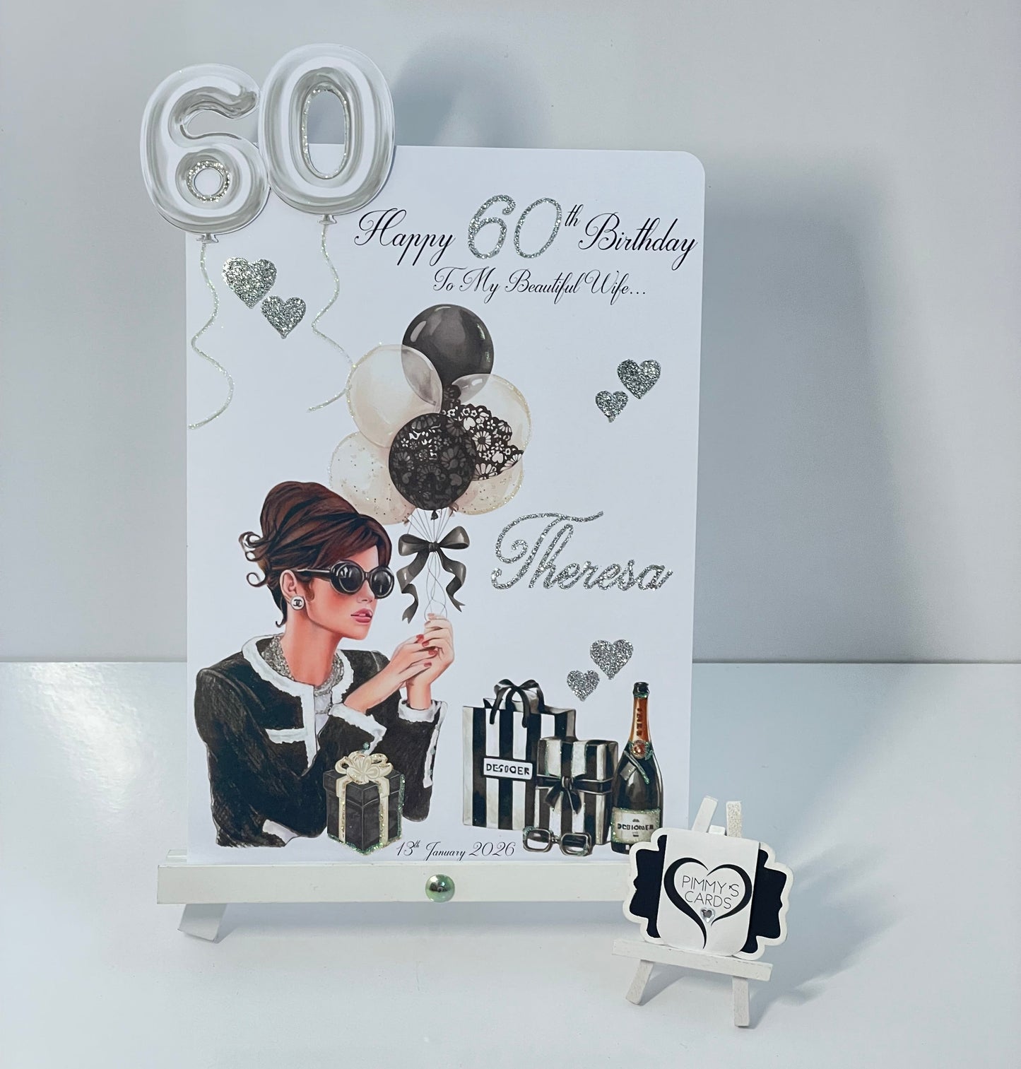 Greeting card with a woman's silhouette and 'Happy 60th Birthday' text on a white background. Personalised handmade 60th birthday card black and silver theme. 