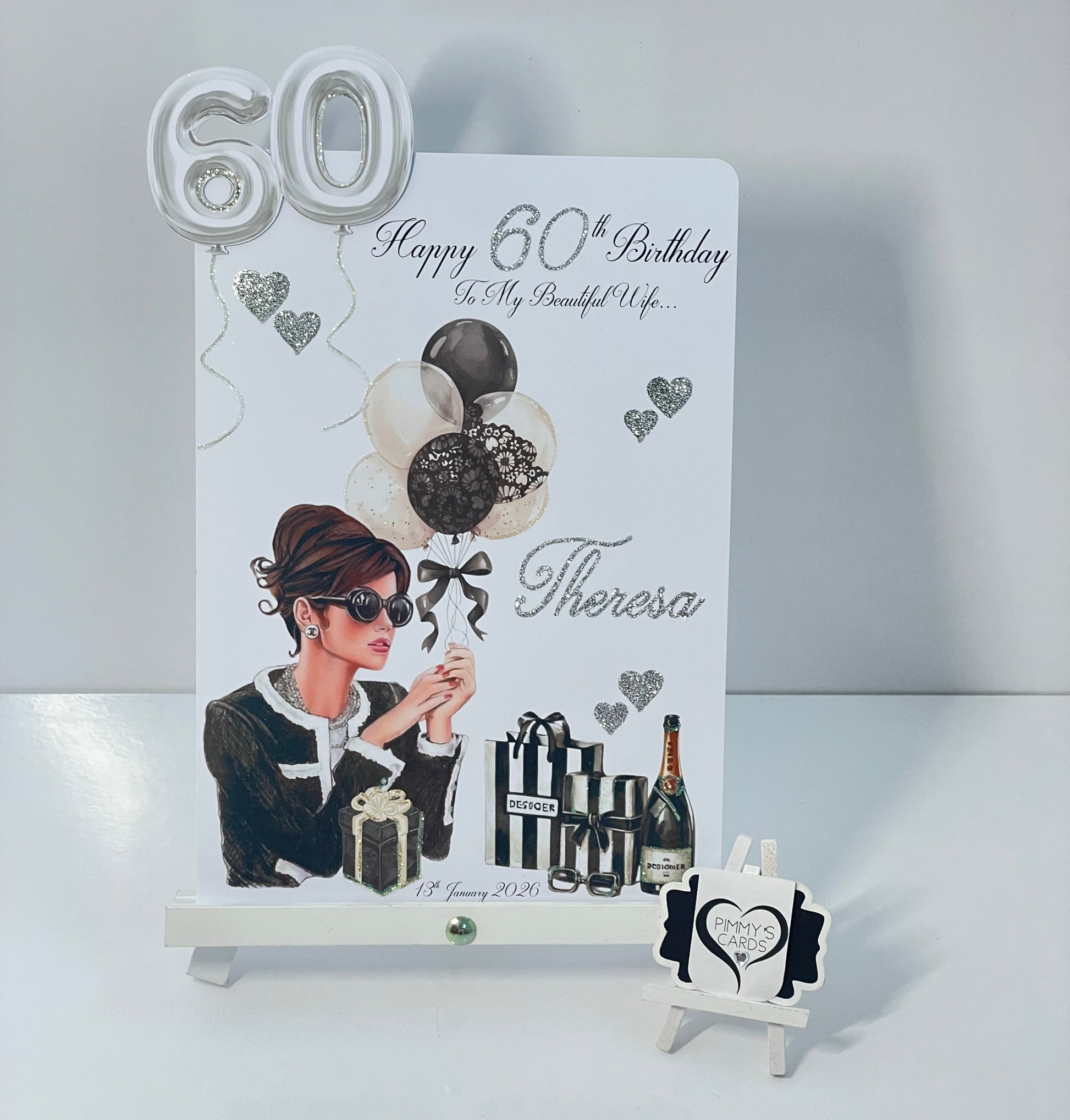 Greeting card with a woman's silhouette and 'Happy 60th Birthday' text on a white background. Personalised handmade 60th birthday card black and silver theme. 