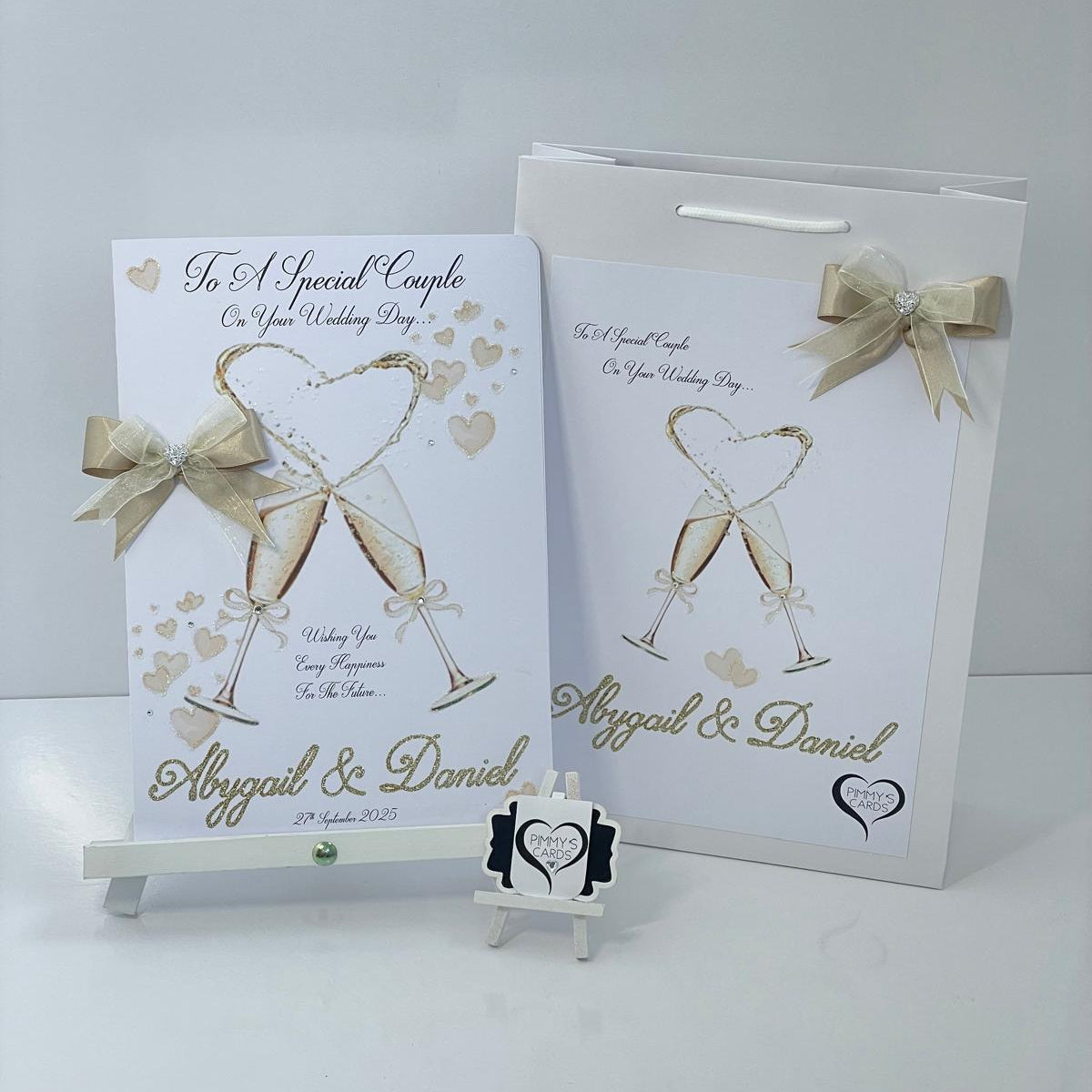 Personalised handmade wedding greeting cards. Champagne glasses design.