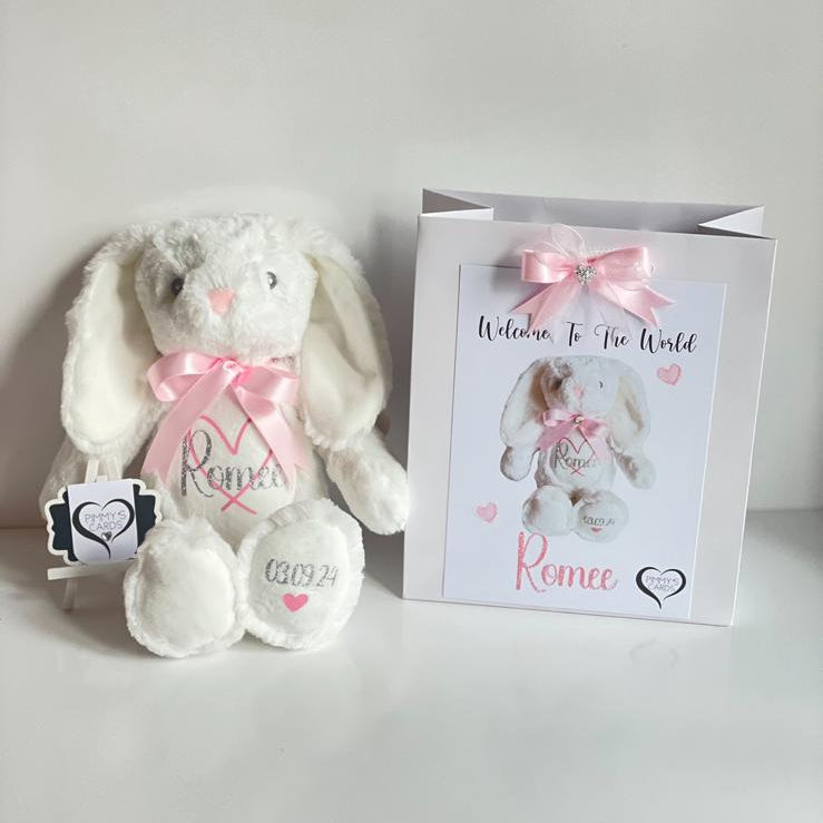 White plush bunny with personalised name and date text on it. Personalised Soft Toy Bunny
